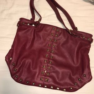 A super cute Charming Charlie red studded purse!